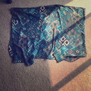 Kimono with sleeve holes